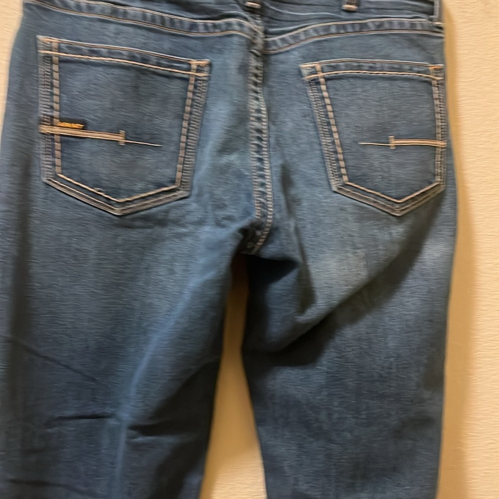 Men’s Ariat Rebar M5 Straight Leg Blue Jeans with Distressed Look. Size 35x36